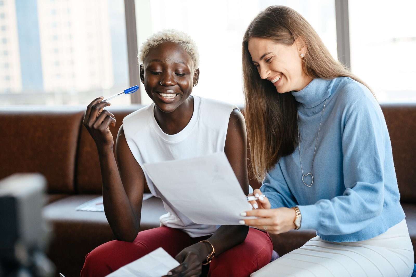 support worker & client laughing