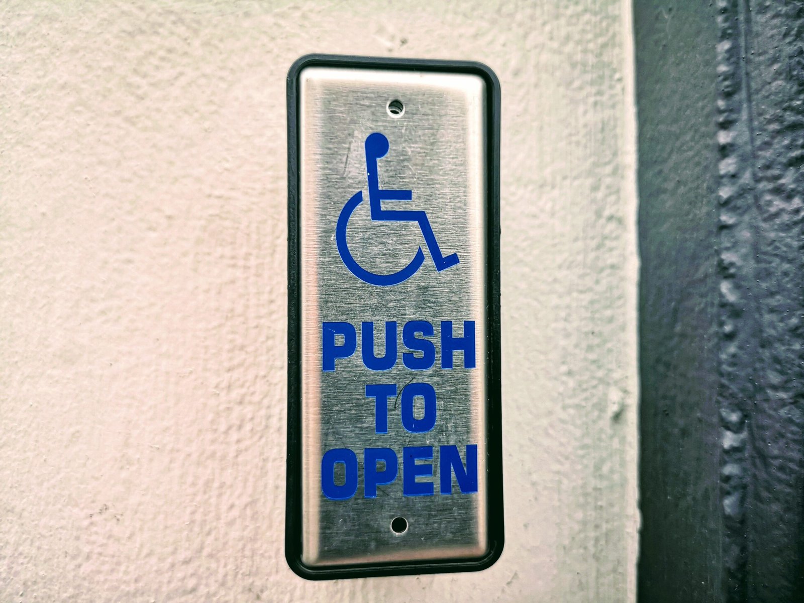 Disabled doo-opening button "push to open"